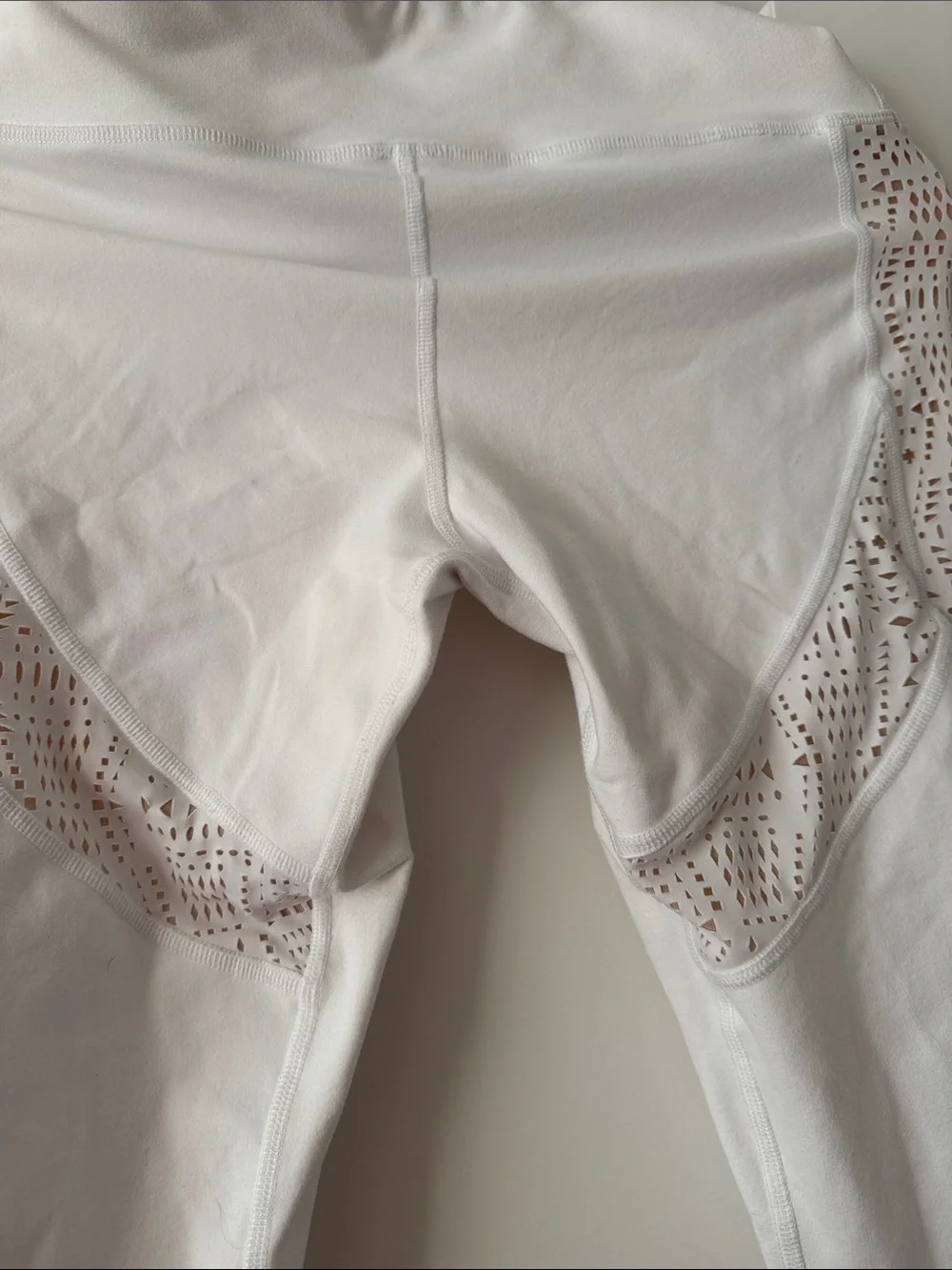 ALO Yoga White 3/4 length leggings with cutouts
